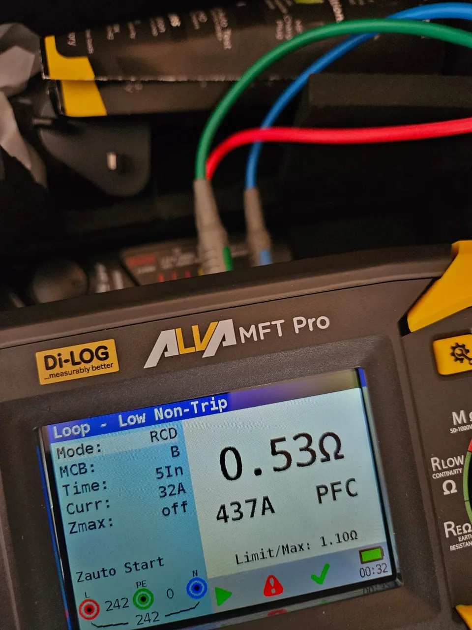 Close-up of an electrical tester and its display